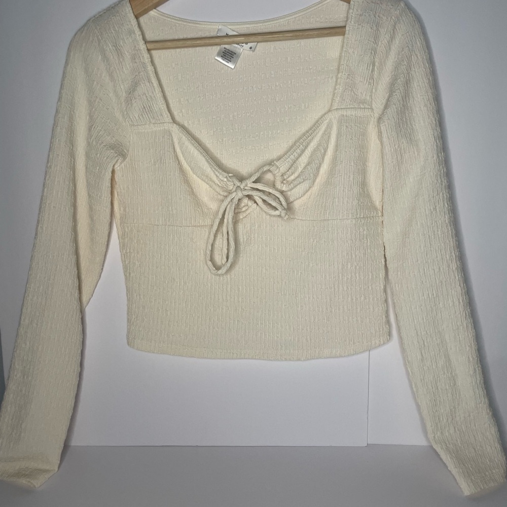 Tie-Front Ribbed Long-Sleeve Crop Top in Cream